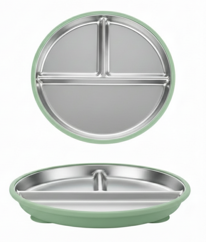 Green and silver kids suction stainless steel divided plate on a white background