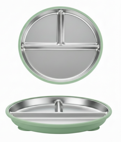 Green and silver kids suction stainless steel divided plate on a white background